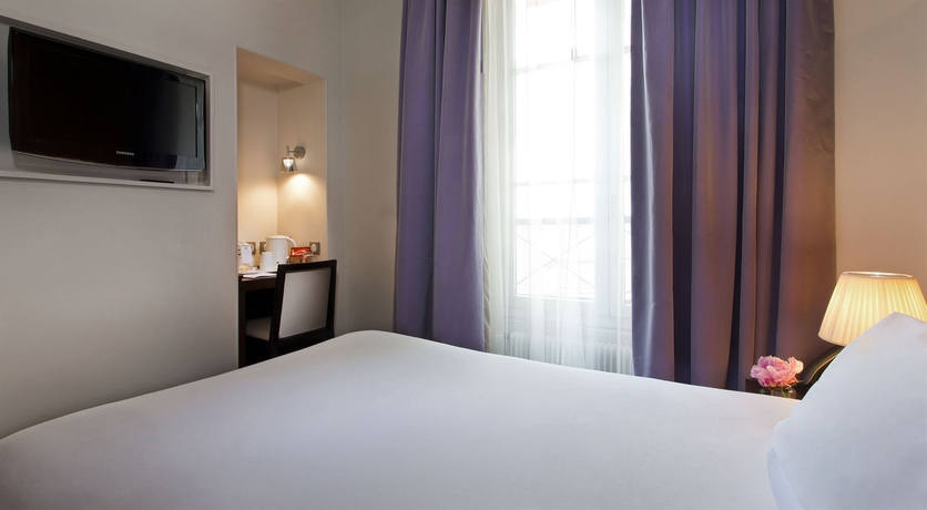 Imagen de la habitación del Hotel Le Colisee. Foto 11