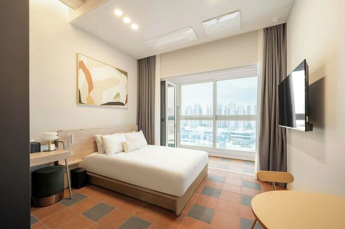 Imagen de la habitación del Hotel Le Collective Siheung Wavepark. Foto 19