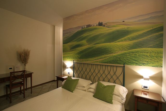 Imagen de la habitación del Hotel Le Colline. Foto 11