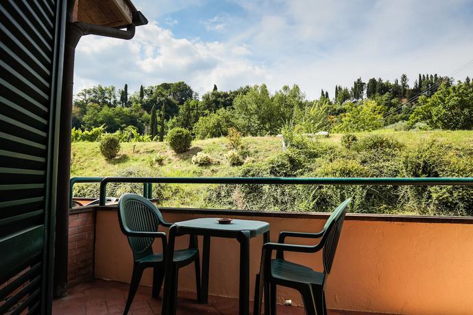 Imagen de la habitación del Hotel Le Colline. Foto 14