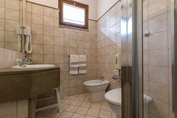 Imagen de la habitación del Hotel Le Colline. Foto 15