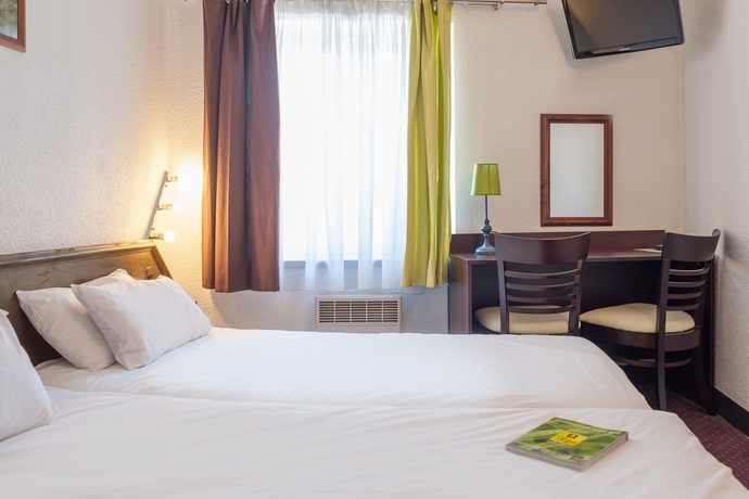 Imagen de la habitación del Hotel Le Collonges. Foto 12