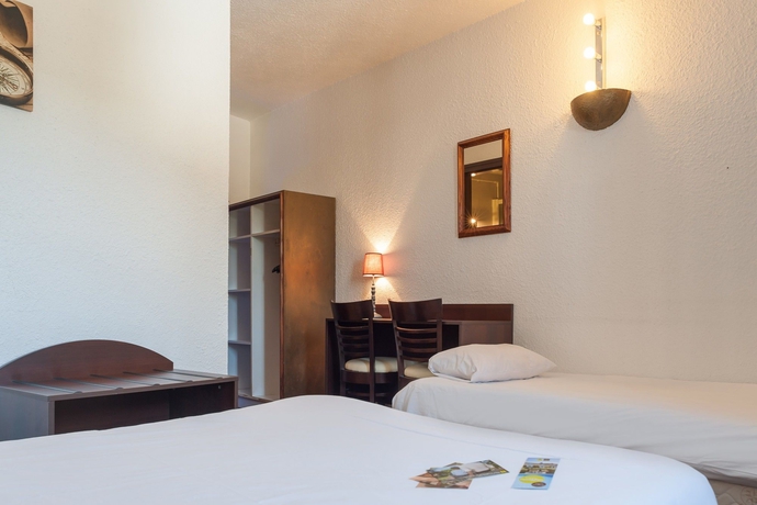 Imagen de la habitación del Hotel Le Collonges. Foto 14