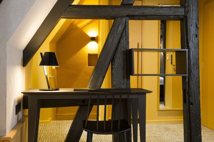 Imagen de la habitación del Hotel Le Colombier Suites. Foto 3