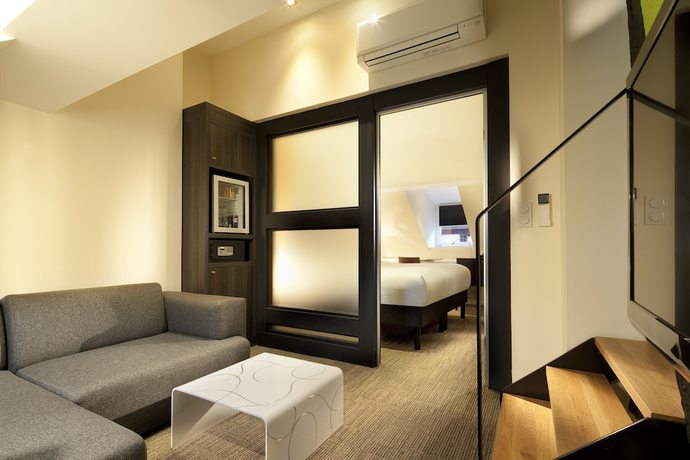 Imagen de la habitación del Hotel Le Colombier Suites. Foto 13