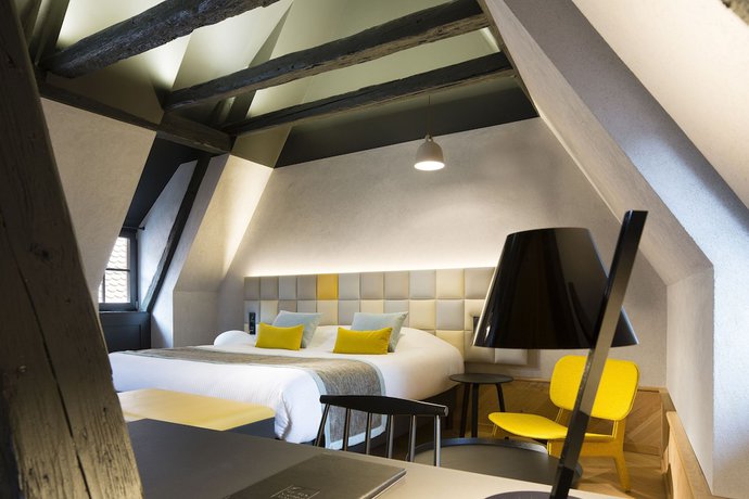 Imagen de la habitación del Hotel Le Colombier Suites. Foto 17