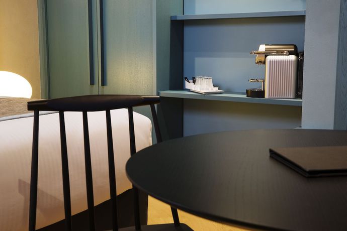 Imagen de la habitación del Hotel Le Colombier Suites. Foto 19