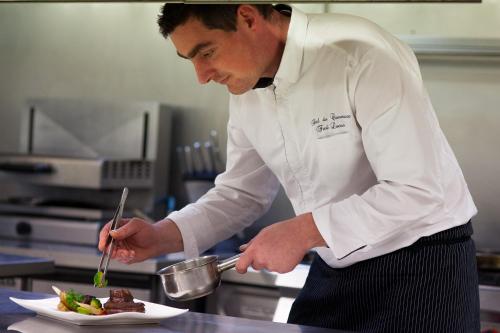 Imagen de la habitación del Hotel Le Commerce. Foto 7