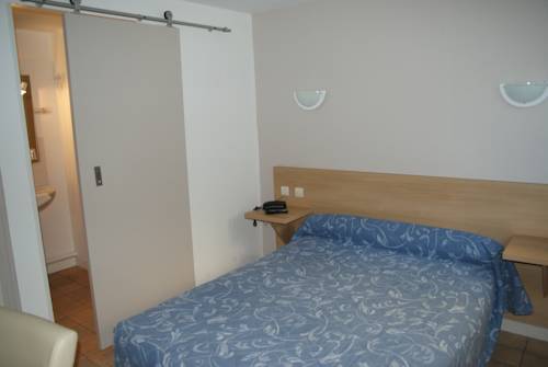 Imagen de la habitación del Hotel Le Commerce, Fecamp. Foto 3