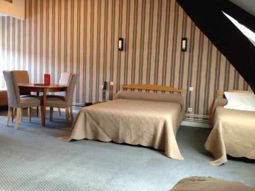 Imagen de la habitación del Hotel Le Commerce, Fecamp. Foto 6