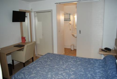 Imagen de la habitación del Hotel Le Commerce, Fecamp. Foto 12