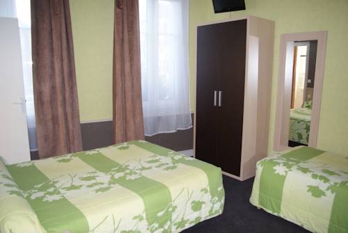 Imagen de la habitación del Hotel Le Commerce, Fecamp. Foto 13