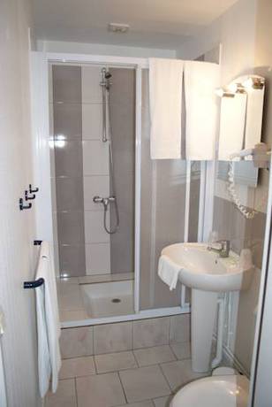 Imagen de la habitación del Hotel Le Commerce, Fecamp. Foto 15