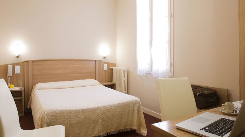 Imagen de la habitación del Hotel Le Commerce, Mirepoix. Foto 12