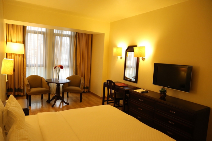 Imagen de la habitación del Hotel Le Commodore. Foto 14