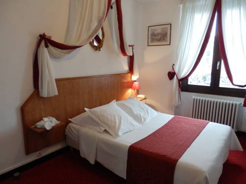 Imagen de la habitación del Hotel Le Comte Rouge. Foto 2