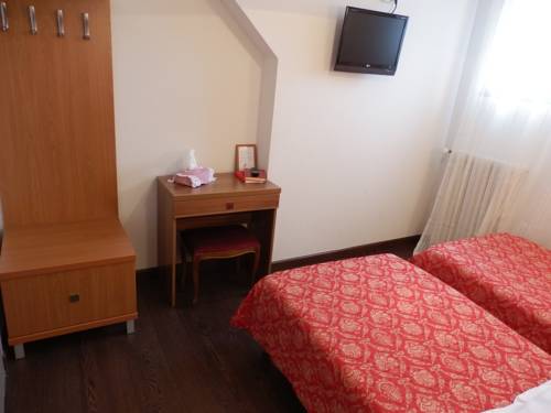 Imagen de la habitación del Hotel Le Comte Rouge. Foto 15