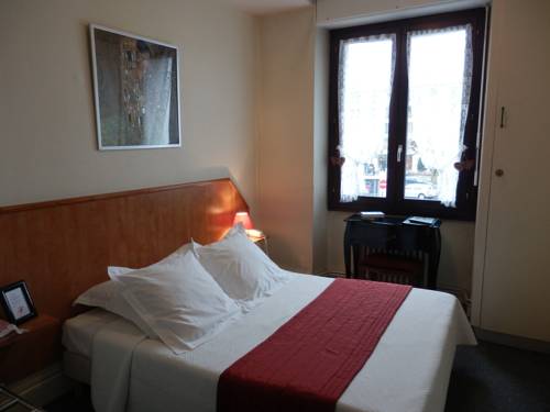 Imagen de la habitación del Hotel Le Comte Rouge. Foto 16