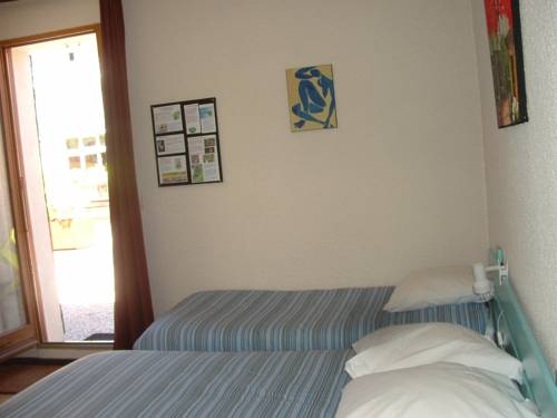 Imagen de la habitación del Hotel Le Connetable. Foto 6