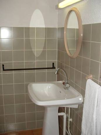 Imagen de la habitación del Hotel Le Connetable. Foto 9