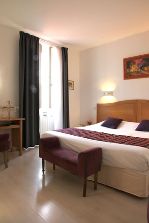 Imagen de la habitación del Hotel Le Continental. Foto 9