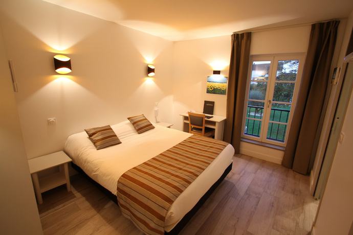 Imagen de la habitación del Hotel Le Continental. Foto 10