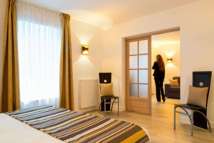 Imagen de la habitación del Hotel Le Continental. Foto 13