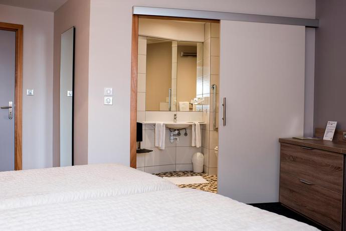 Imagen de la habitación del Hotel Le Coquelicot. Foto 4