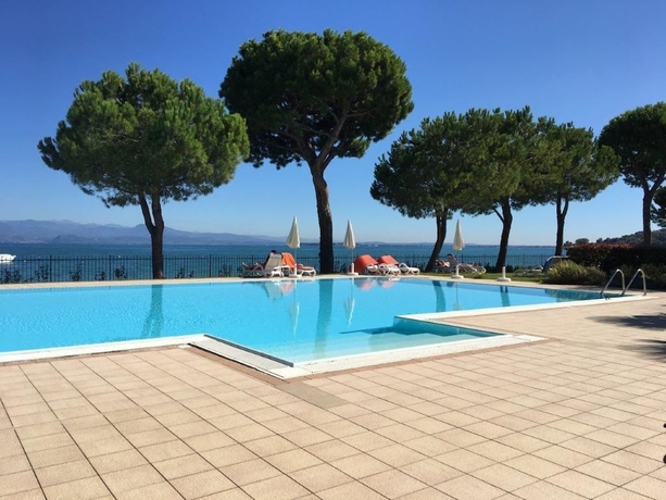 Imagen de la piscina del Hotel Le Corti del Lago - Apartments. Foto 18