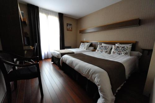 Imagen de la habitación del Hotel Le Cottage. Foto 7