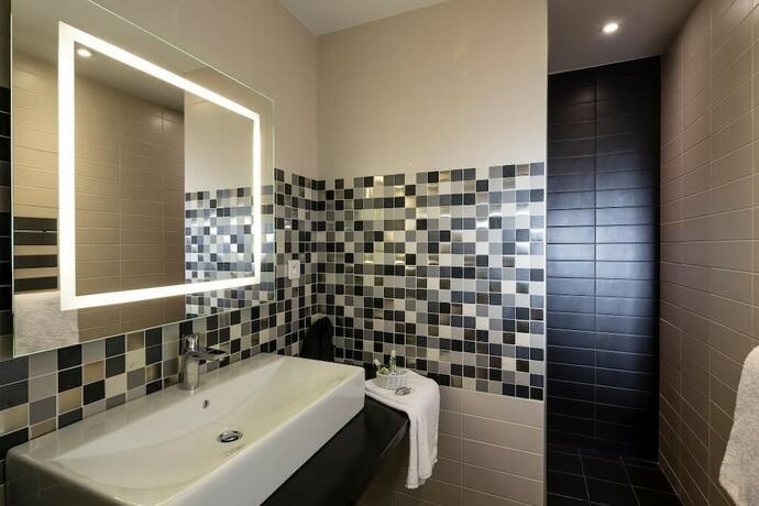 Imagen de la habitación del Hotel Le Cottage de Clairefontaine. Foto 17