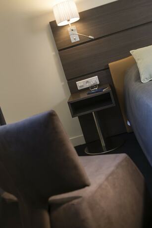 Imagen de la habitación del Hotel Le Cottage de Clairefontaine. Foto 18