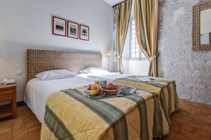 Imagen de la habitación del Hotel Le Couvent Royal. Foto 6
