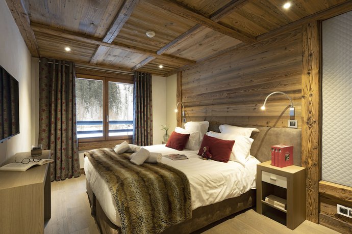 Imagen de la habitación del Hotel Le Cristal de Jade. Foto 8