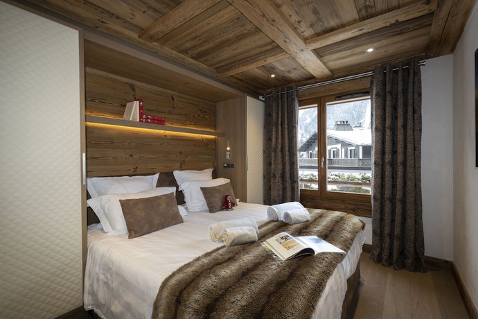 Imagen de la habitación del Hotel Le Cristal de Jade. Foto 10
