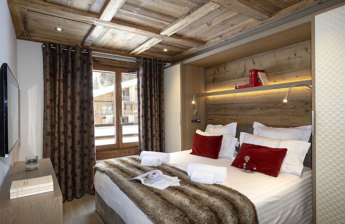 Imagen de la habitación del Hotel Le Cristal de Jade. Foto 18