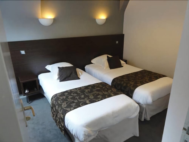Imagen de la habitación del Hotel Le Croiseur. Foto 12