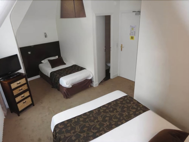 Imagen de la habitación del Hotel Le Croiseur. Foto 13
