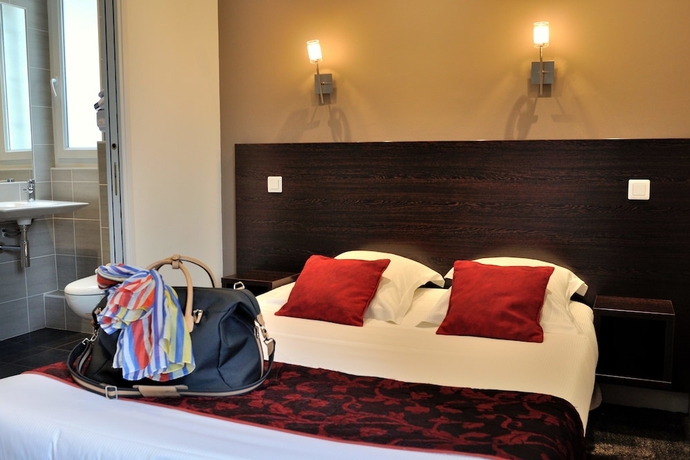 Imagen de la habitación del Hotel Le Croiseur. Foto 16