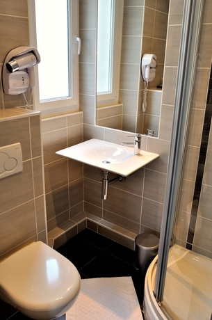 Imagen de la habitación del Hotel Le Croiseur. Foto 19
