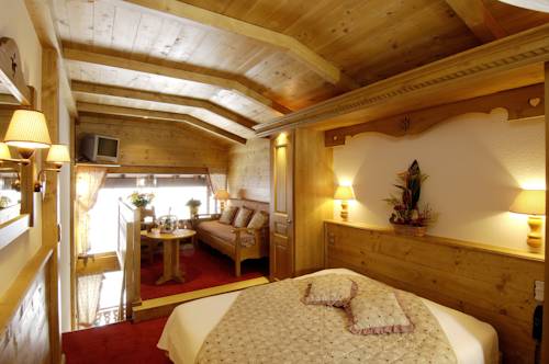 Imagen de la habitación del Hotel Le Dahu Hotels-chalets De Tradition. Foto 2