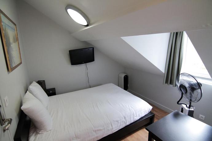 Imagen de la habitación del Hotel Le Daly's. Foto 3