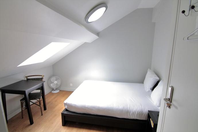 Imagen de la habitación del Hotel Le Daly's. Foto 4