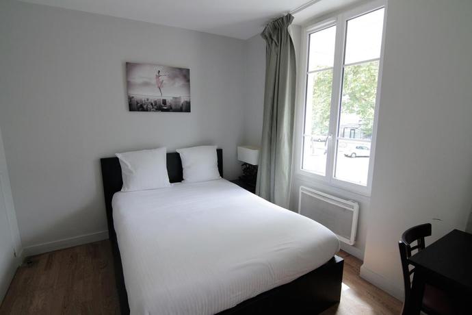 Imagen de la habitación del Hotel Le Daly's. Foto 6