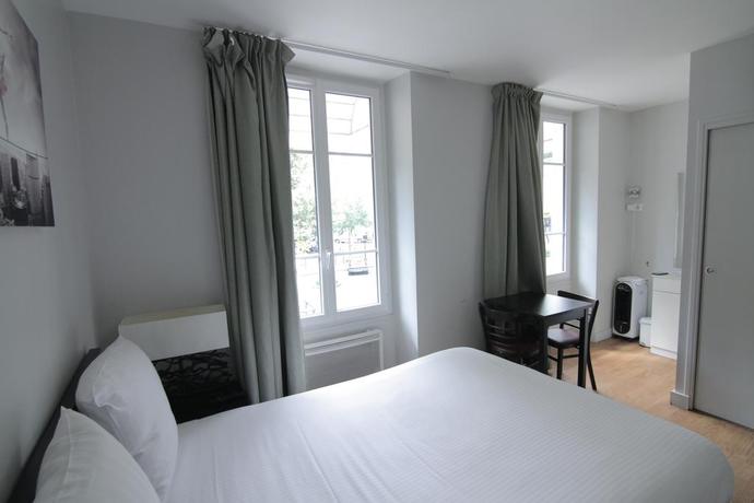 Imagen de la habitación del Hotel Le Daly's. Foto 7