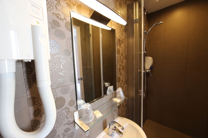 Imagen de la habitación del Hotel Le Daum. Foto 16