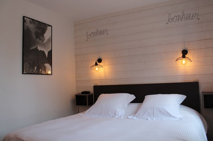 Imagen de la habitación del Hotel Le Dauphin Les Loges. Foto 3