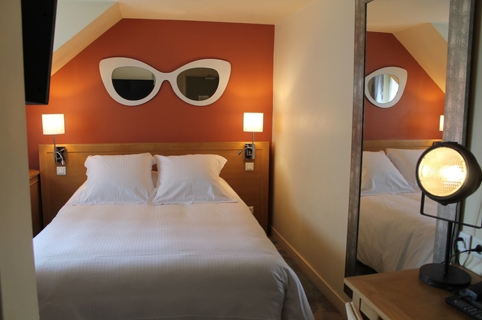 Imagen de la habitación del Hotel Le Dauphin Les Loges. Foto 11