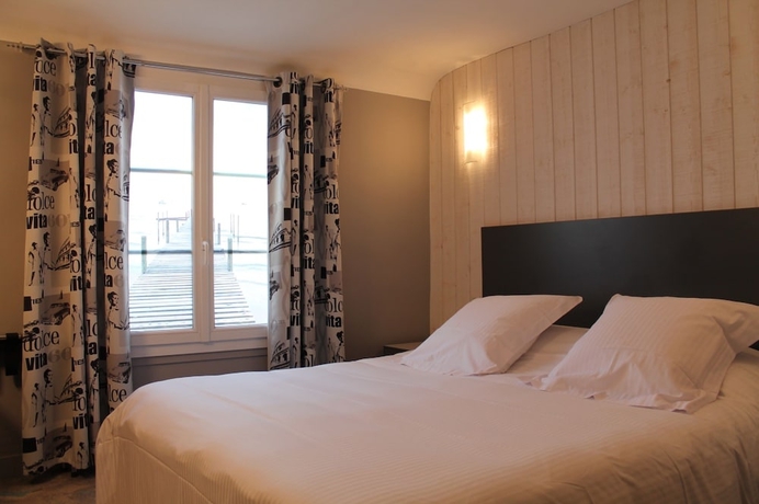 Imagen de la habitación del Hotel Le Dauphin Les Loges. Foto 15