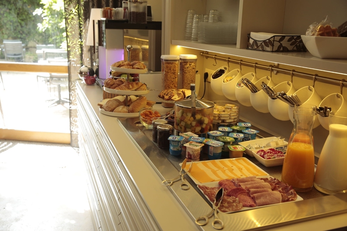 Imagen del bar/restaurante del Hotel Le Dauphin, Quartier Boieldieu. Foto 3